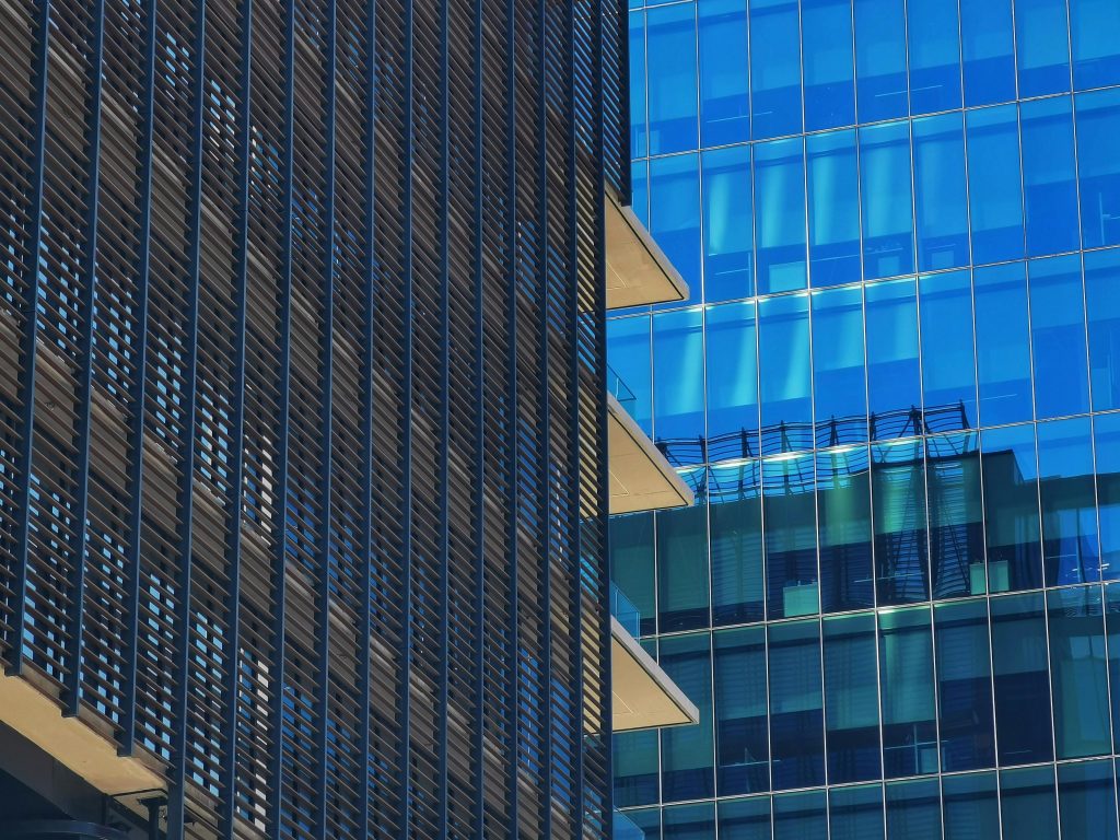 Contemporary office buildings with glass facades and geometric design in Santiago, Chile.